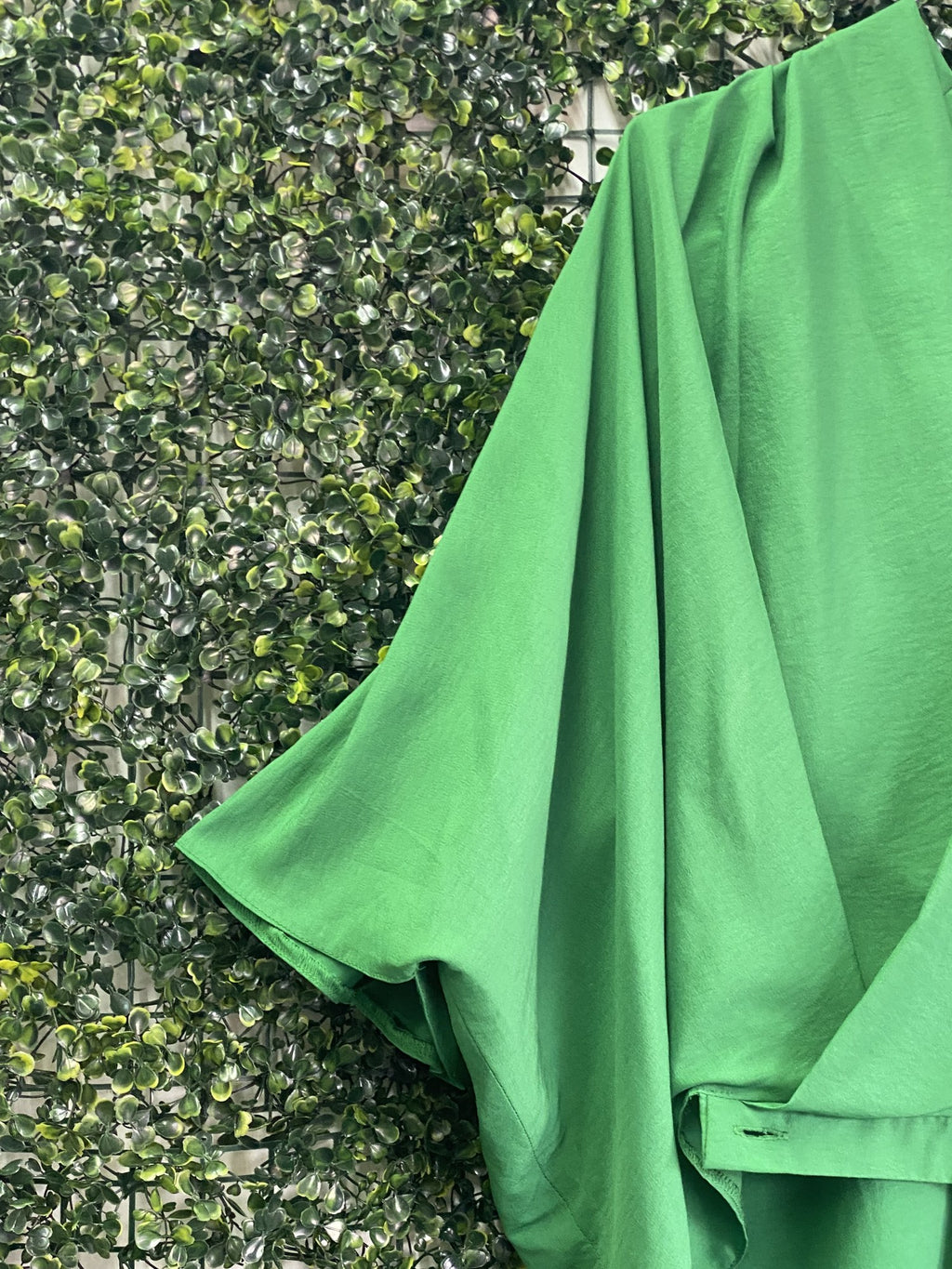 Leigh Schubert Emerald Green Draped Blouse — detail