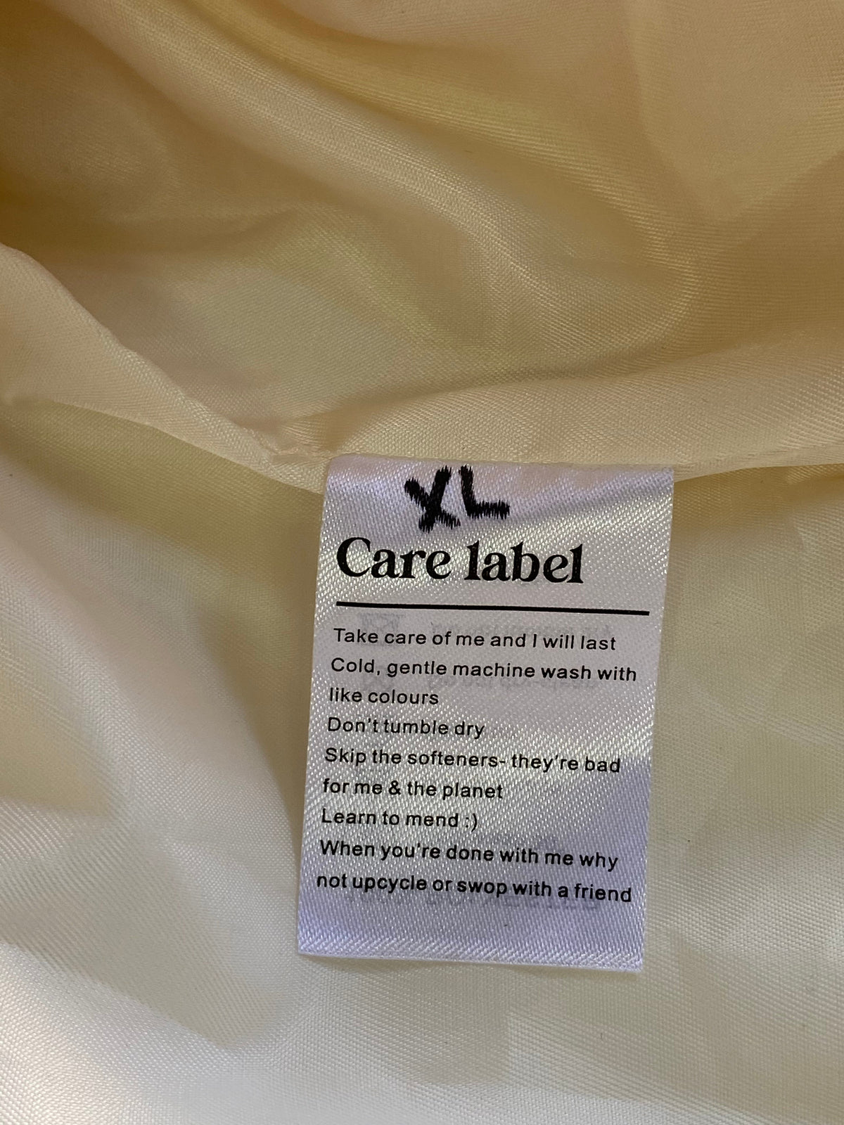 Cream Puffer Vest — care