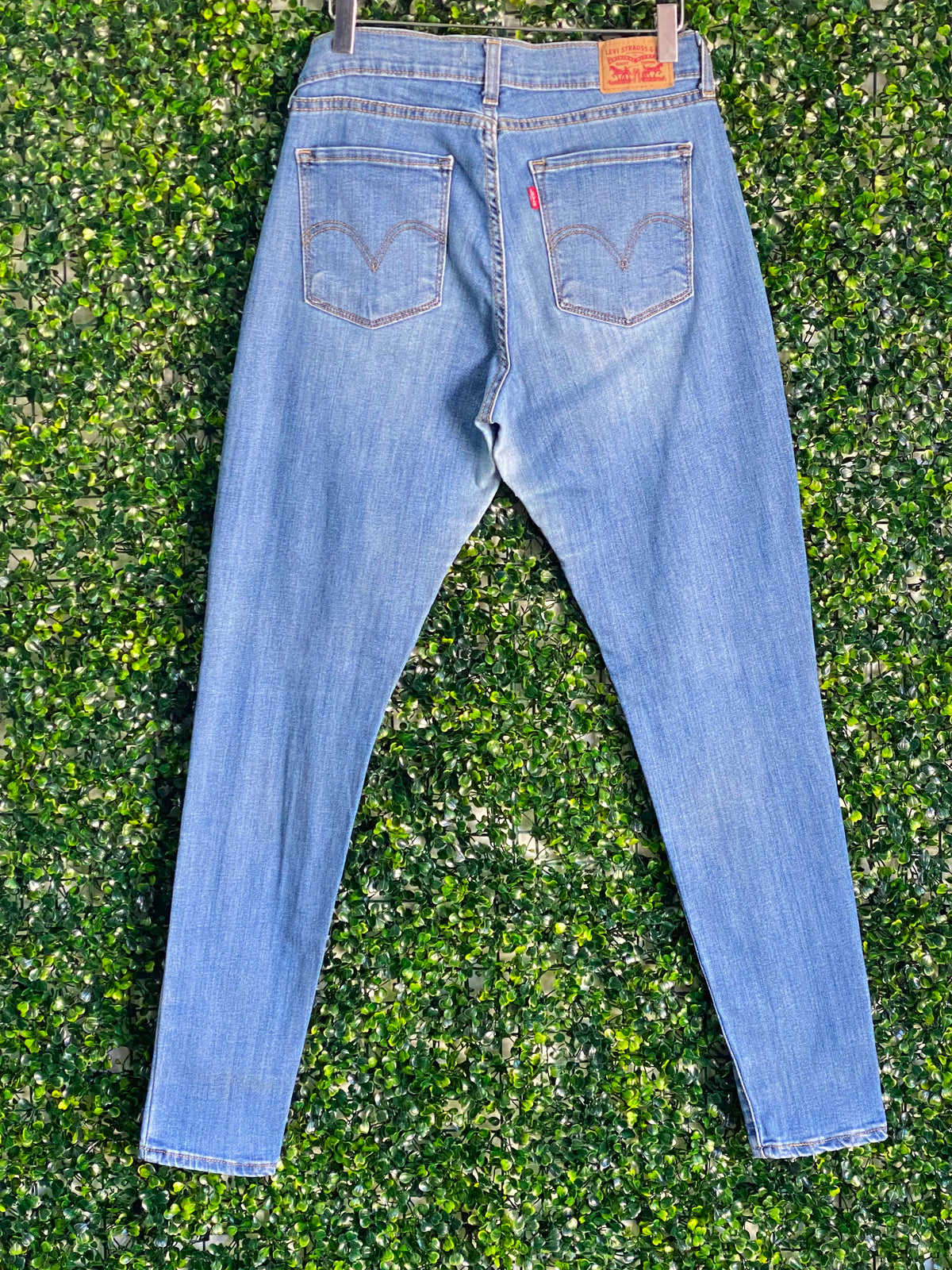 Levi's Mid-Wash Distressed Curvy Skinny Jeans — back