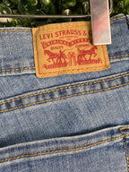 Levi's Mid-Wash Distressed Curvy Skinny Jeans — brand