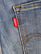 Levi's Mid-Wash Distressed Curvy Skinny Jeans — brand