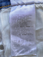 Levi's Mid-Wash Distressed Curvy Skinny Jeans — care