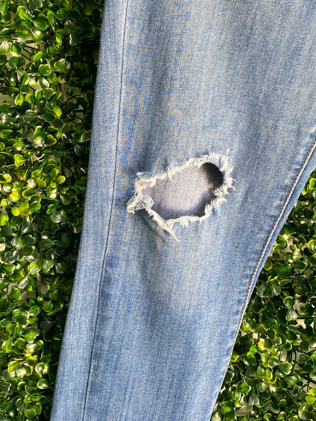 Levi's Mid-Wash Distressed Curvy Skinny Jeans — detail