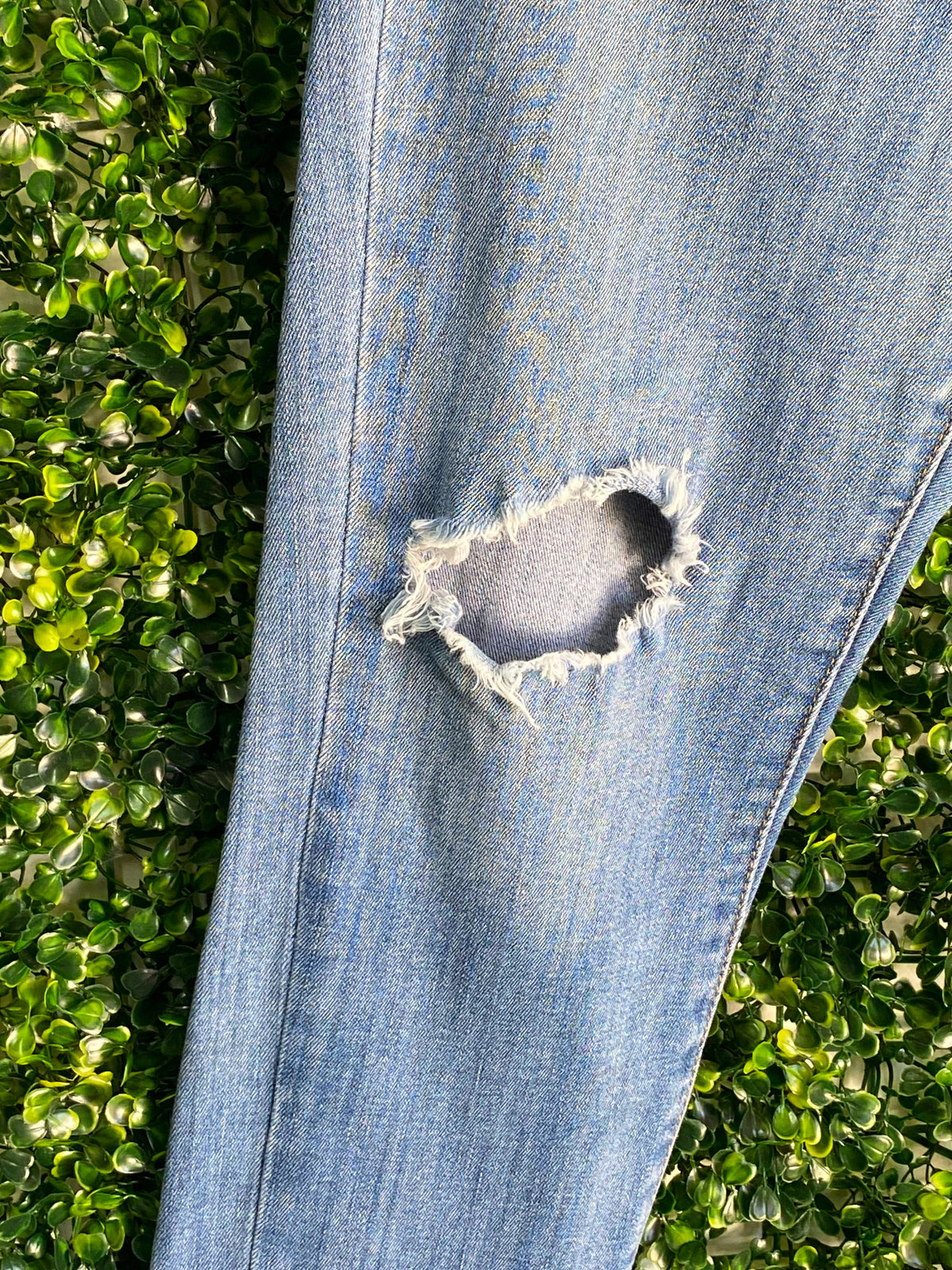 Levi's Mid-Wash Distressed Curvy Skinny Jeans — detail