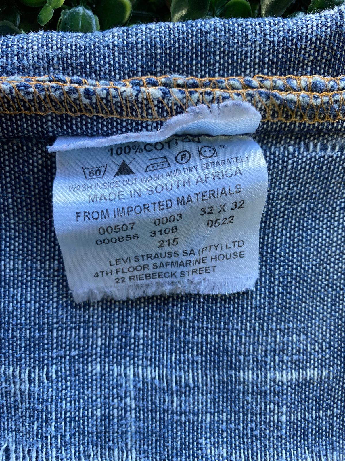 Levi's 507 Distressed Standard-Fit Jeans — care