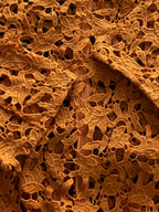 Stella Burnt Orange Crochet Lace High-Low Shirt — detail