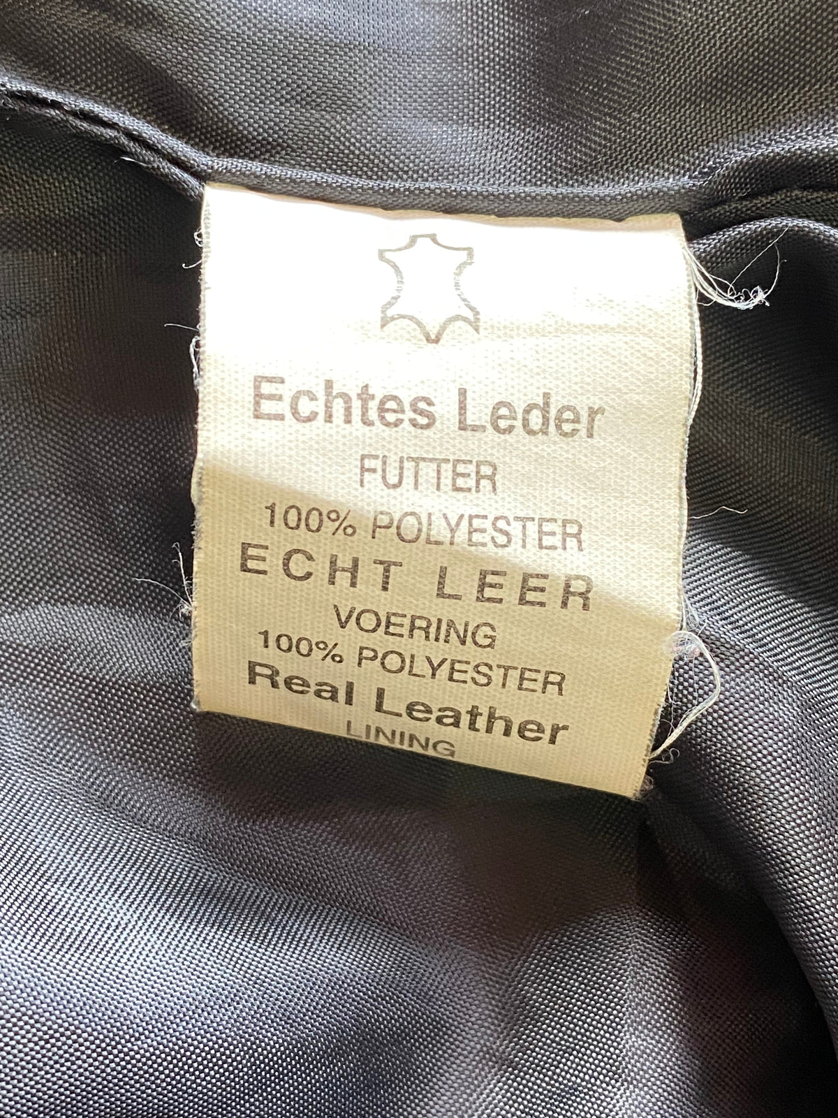 Real Leather Garments Black Longline Leather Coat — care