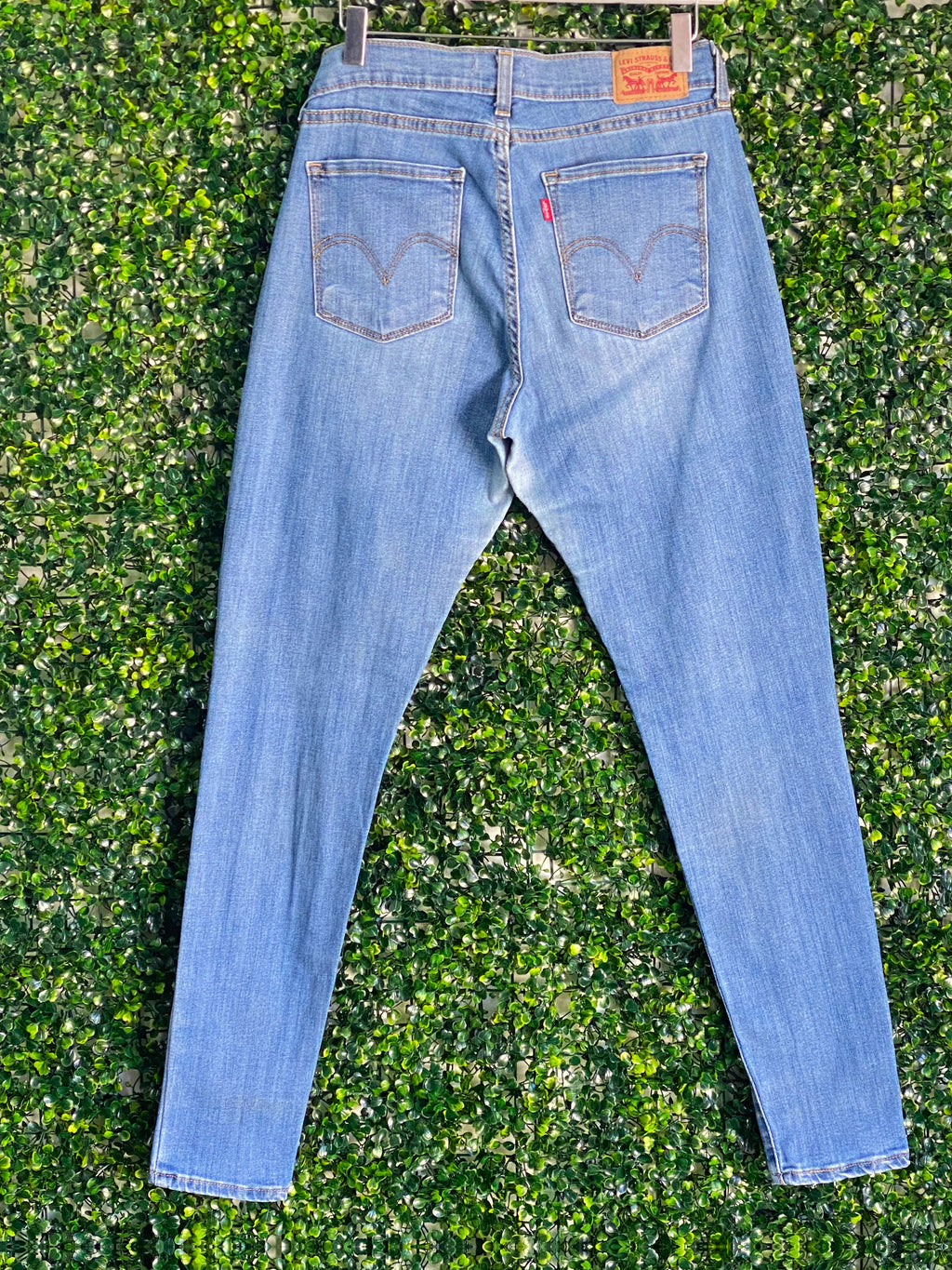 Levi's Mid-Wash Distressed Curvy Skinny Jeans — back