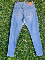 Levi's Mid-Wash Distressed Curvy Skinny Jeans — back
