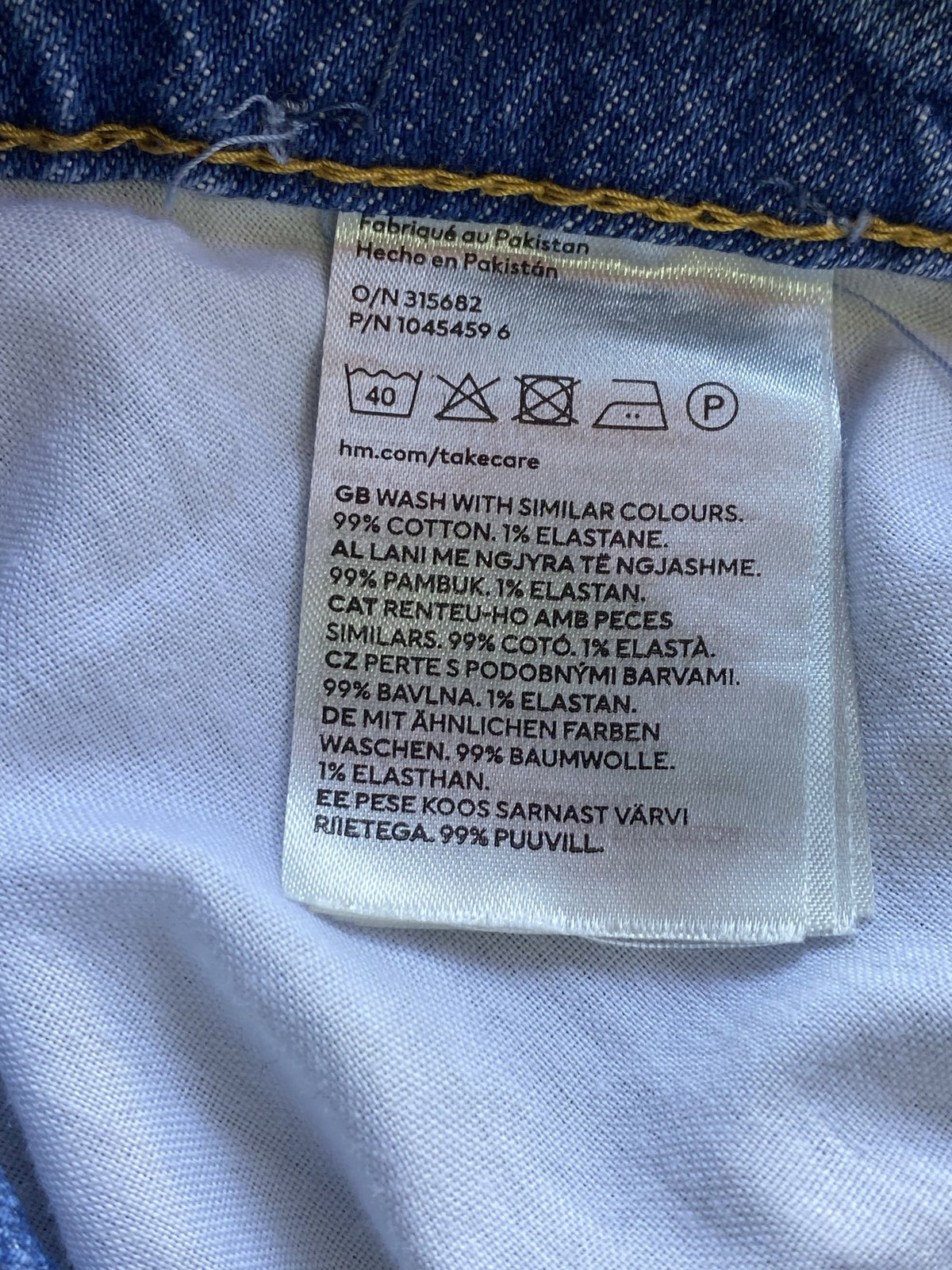 H&M Light-Wash Distressed Straight-Leg Jeans — care
